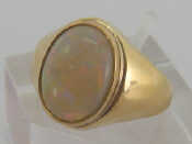 Appraisal: A carat yellow gold and opal ring the central stone