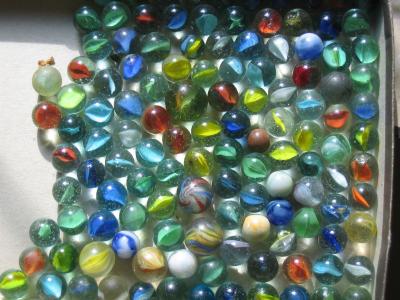 Appraisal: Approximately one hundred and thirty glass marbles various sizes early