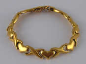 Appraisal: An carat gold bracelet with heart motifs approx cm long