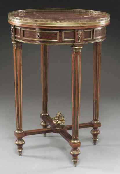 Appraisal: Louis XVI style gueridon table with marble top andbronze mounts