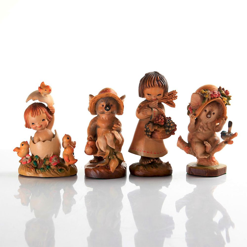 Appraisal: ANRI WOOD CARVING FIGURINES Handcrafted hand painted marked stamped and