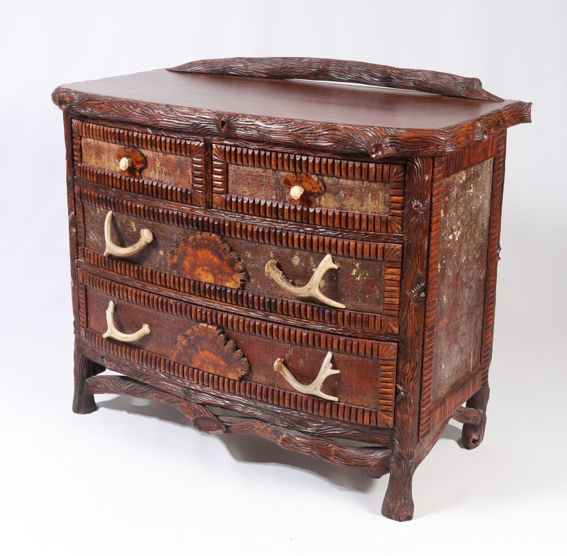 Appraisal: TIMPSON GALLERY CARVED CHEST OF DRAWERS Finely carved figural branch