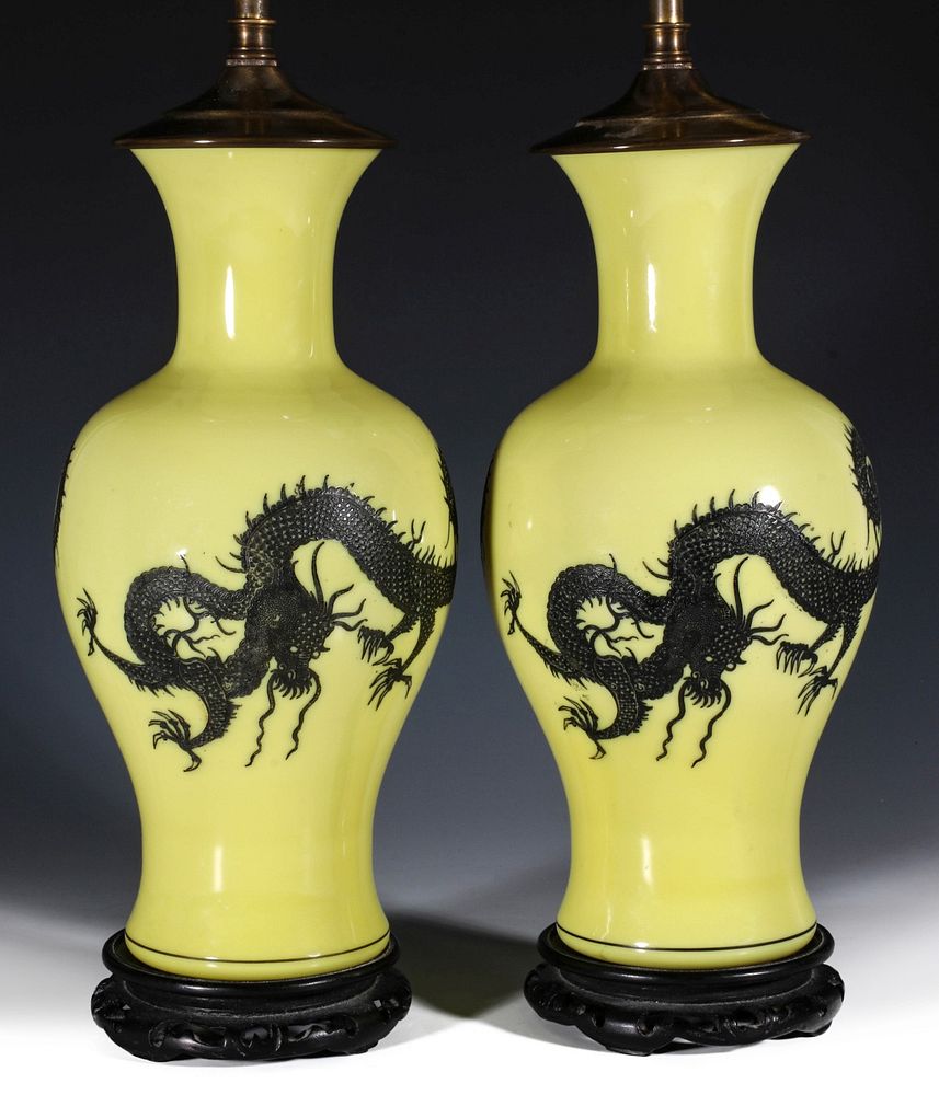 Appraisal: A PEKING GLASS LAMP PAIR WITH INCISED DRAGON MOTIF Each