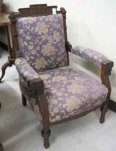 Appraisal: VICTORIAN ARMCHAIR Eastlake style American c having a carved walnut