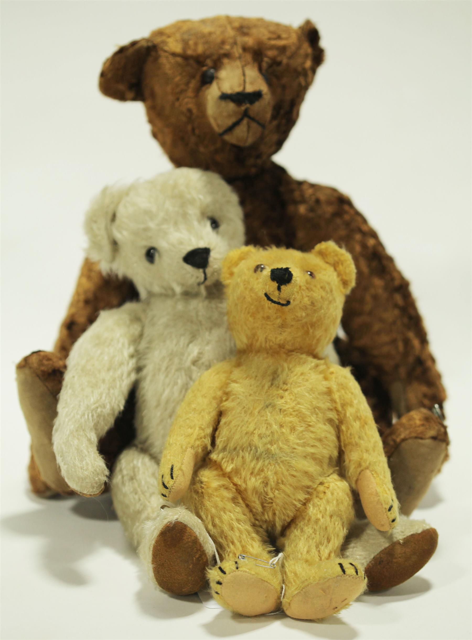 Appraisal: THREE MOHAIR BEARS ONE WITH HUMPBACK American or German early