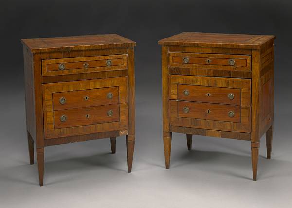 Appraisal: A pair of Italian Neoclassical parcel ebonized and fruitwood commodini