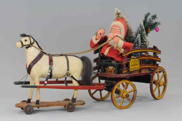 Appraisal: ST CLAUS IN WOOD WAGON Stake side horse drawn wagon