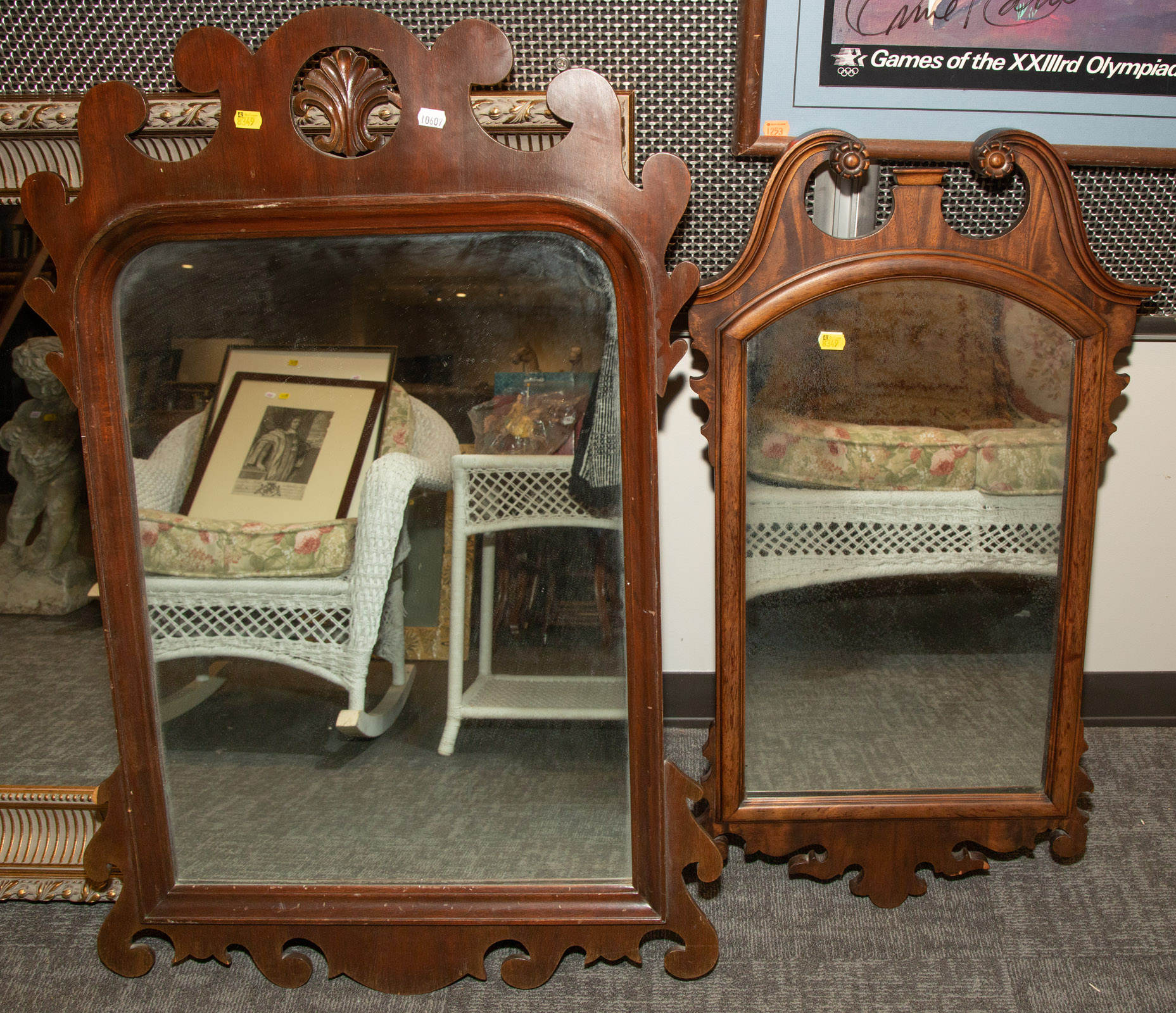 Appraisal: TWO MIRRORS WITH MAHOGANY FRAMES Larger is in H in