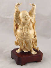 Appraisal: A finely carved Chinese ivory figure of a dancing Buddha