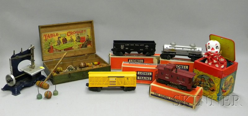 Appraisal: Seven Toys four Lionel train cars table croquet set in