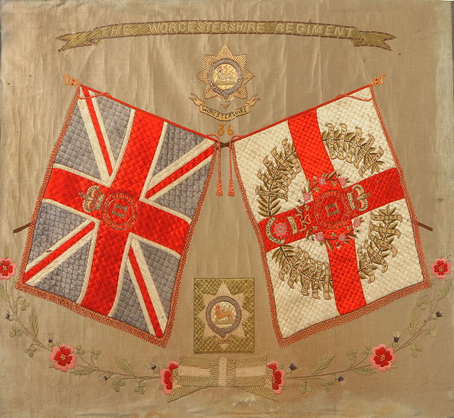 Appraisal: A Worcestershire Regimental silk and embrodered panel depicting the flags