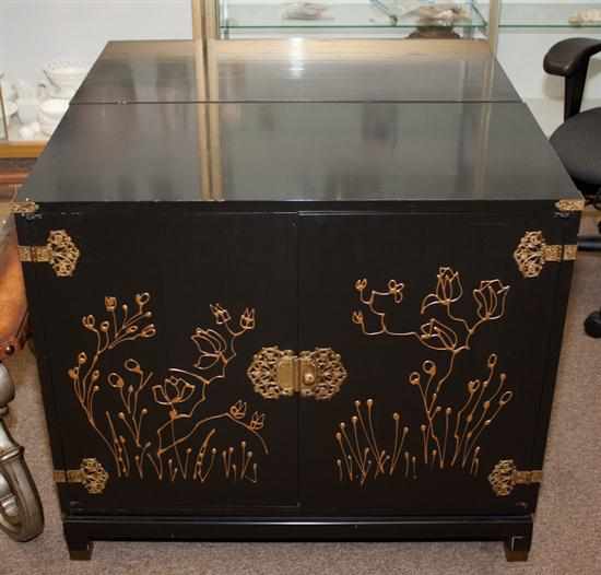 Appraisal: Pair of Chinese Influence ebonized and brass-mounted cabinets Estimate -