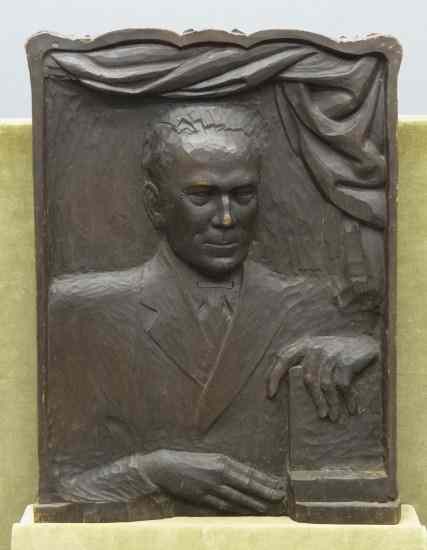 Appraisal: Vintage relief carved plaque of John Hopkins Inscribed on back