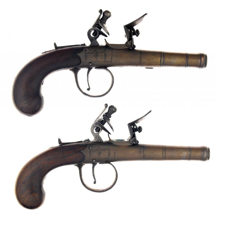 Appraisal: A PAIR OF FLINTLOCK POCKET PISTOLS with brass cm turn-off