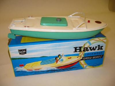 Appraisal: A Hawk speedboat clockwork white deck green hull long -