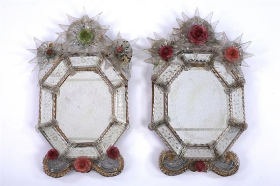 Appraisal: PAIR VENETIAN OCTAGONAL WALL MIRRORS early th century Floral-crest over