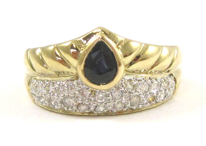 Appraisal: SAPPHIRE DIAMOND AND FOURTEEN KARAT GOLD RING with round-cut diamonds