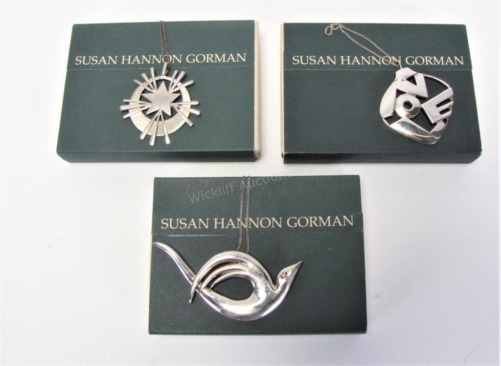 Appraisal: Three Susan Hannon Gorman sterling ornaments including one depicting LOVE