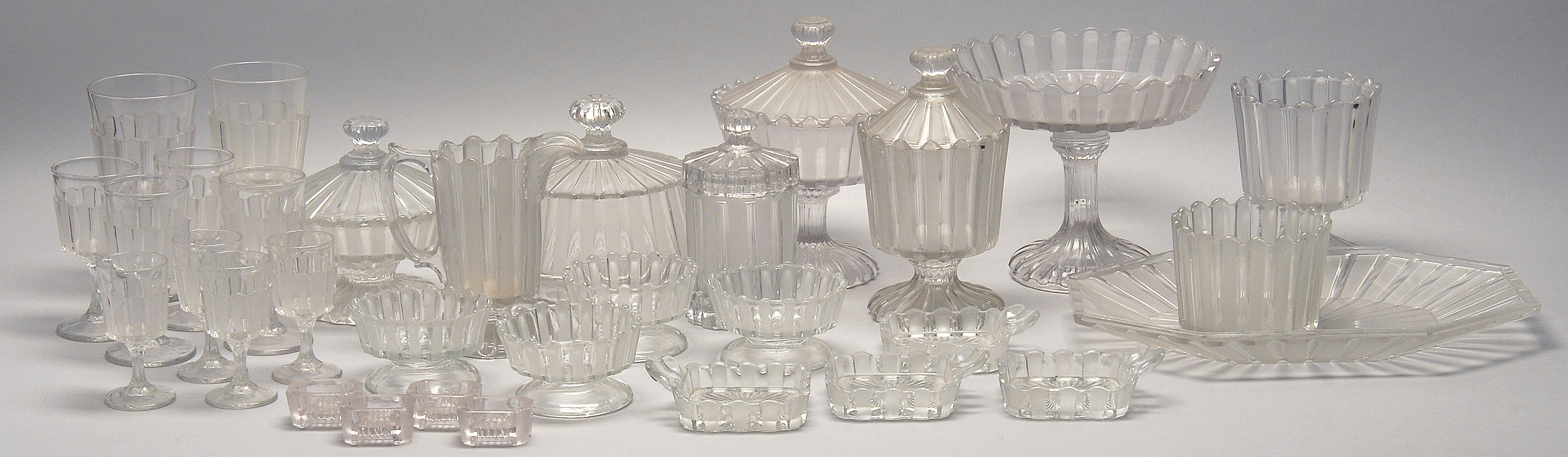 Appraisal: SET OF THIRTY-TWO PIECES OF NON-FLINT CLEAR PATTERN GLASS Late