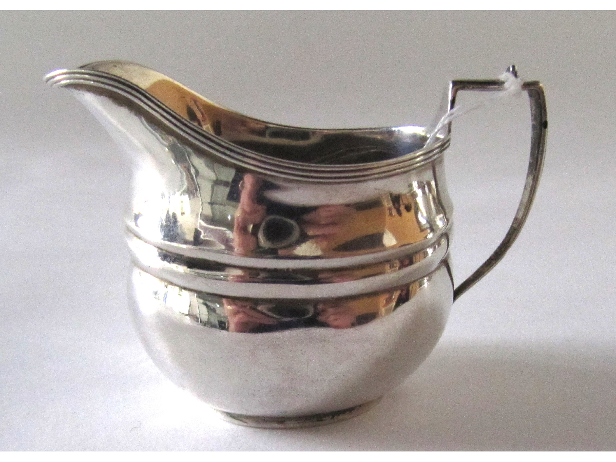 Appraisal: A silver cream jug Birmingham