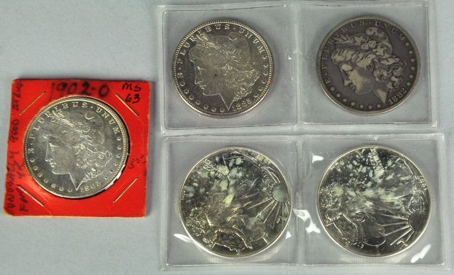 Appraisal: Five Silver DollarsIncludes two BU Silver Eagles an cleaned -O