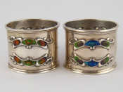 Appraisal: A pair of Liberty Co Arts and Crafts silver napkin