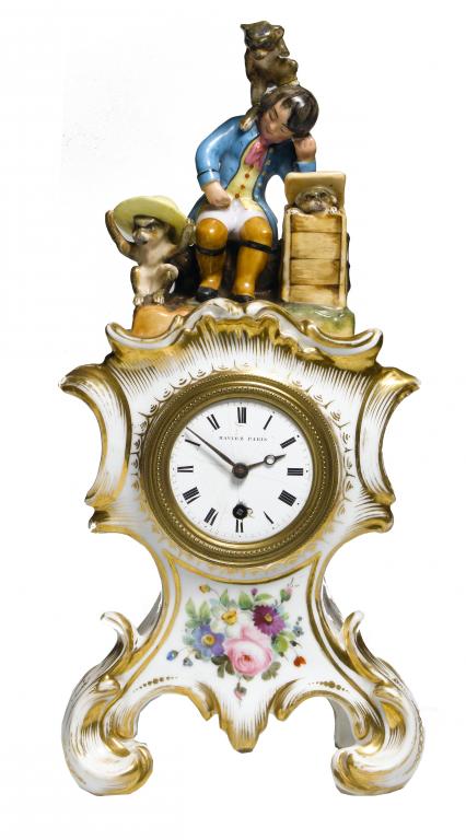 Appraisal: A FRENCH PORCELAIN MANTEL TIMEPIECE signed on the enamel dial