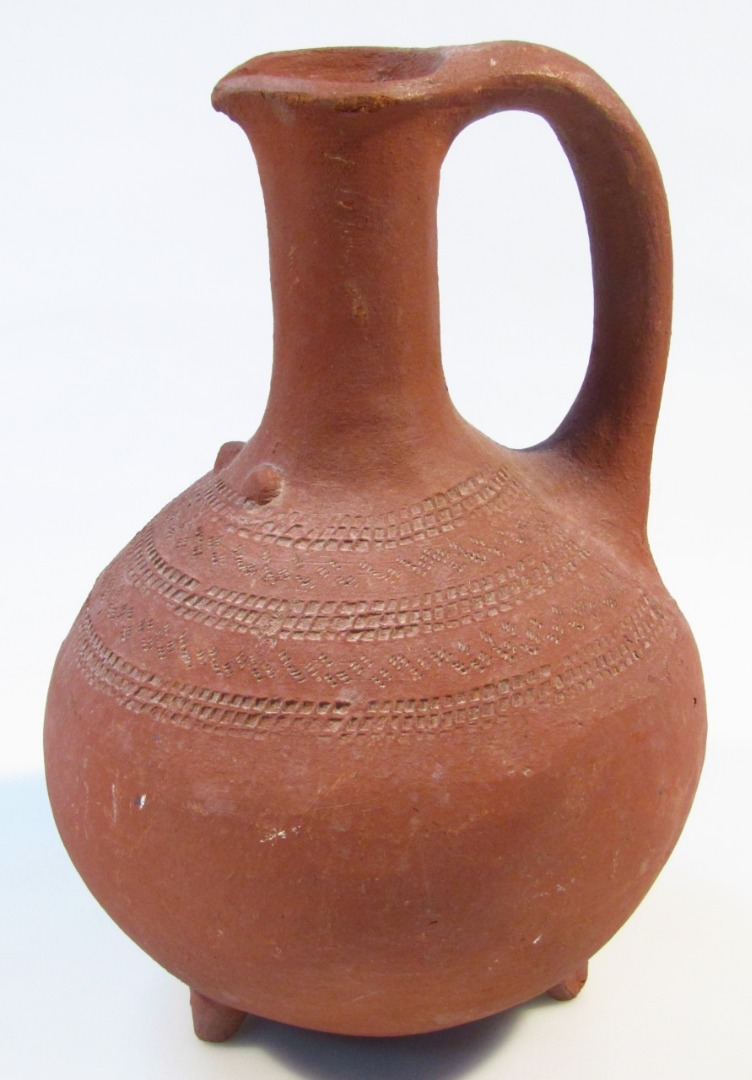 Appraisal: A thC red ware terracotta flagon the bulbous body with