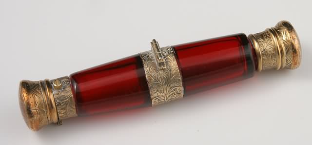 Appraisal: Both silver gilt tops and hinged center ruby glass lacks