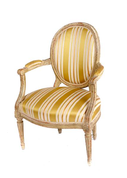 Appraisal: A pair of Louis XVI style fauteuils height in width