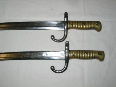 Appraisal: TWO FRENCH CHASSEPOT BAYONETS with steel guard brass hilt yataghan