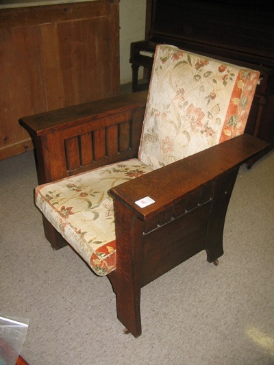 Appraisal: CRAFTSMAN OAK ARMCHAIR American c having tapered plank arms over