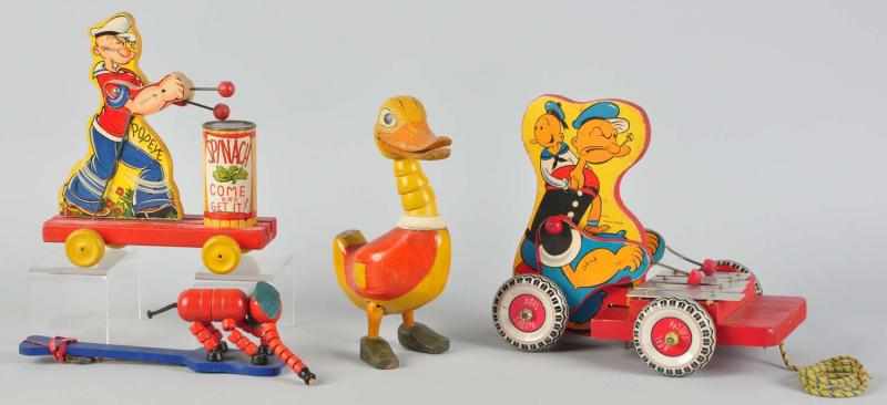 Appraisal: Lot of Wooden Character Toys American Includes Fisher Price Boom