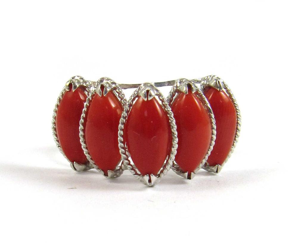 Appraisal: RED CORAL RING Marquise-shaped coral cabochons total cts K white