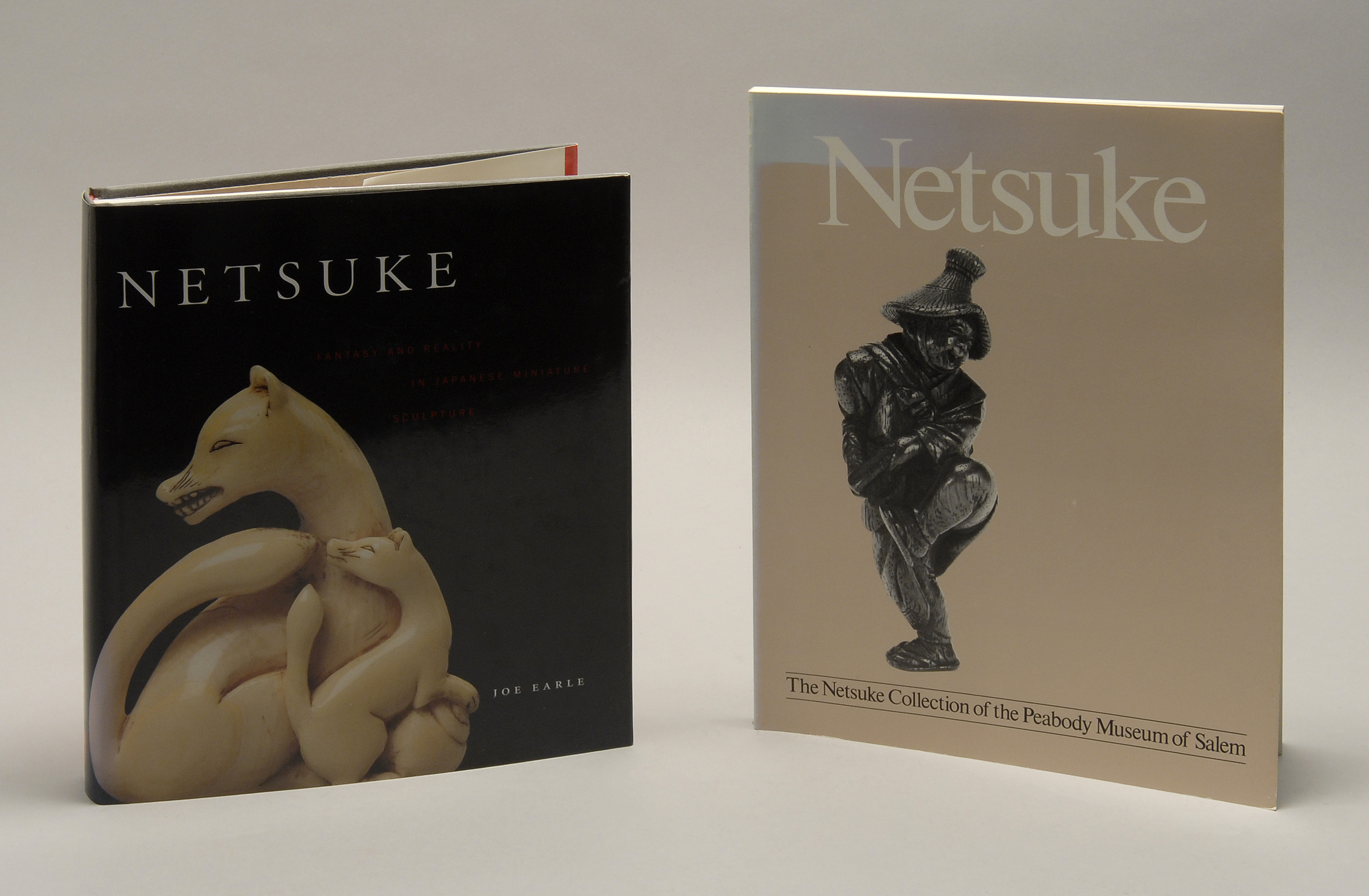 Appraisal: TWO VOLUMES RELATING TO NETSUKE Netsuke by Joe Earle and