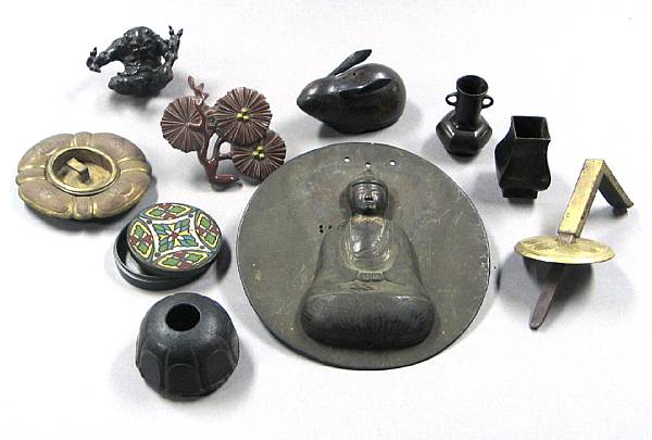 Appraisal: A group of ten Japanese bronze decorations Including a partial