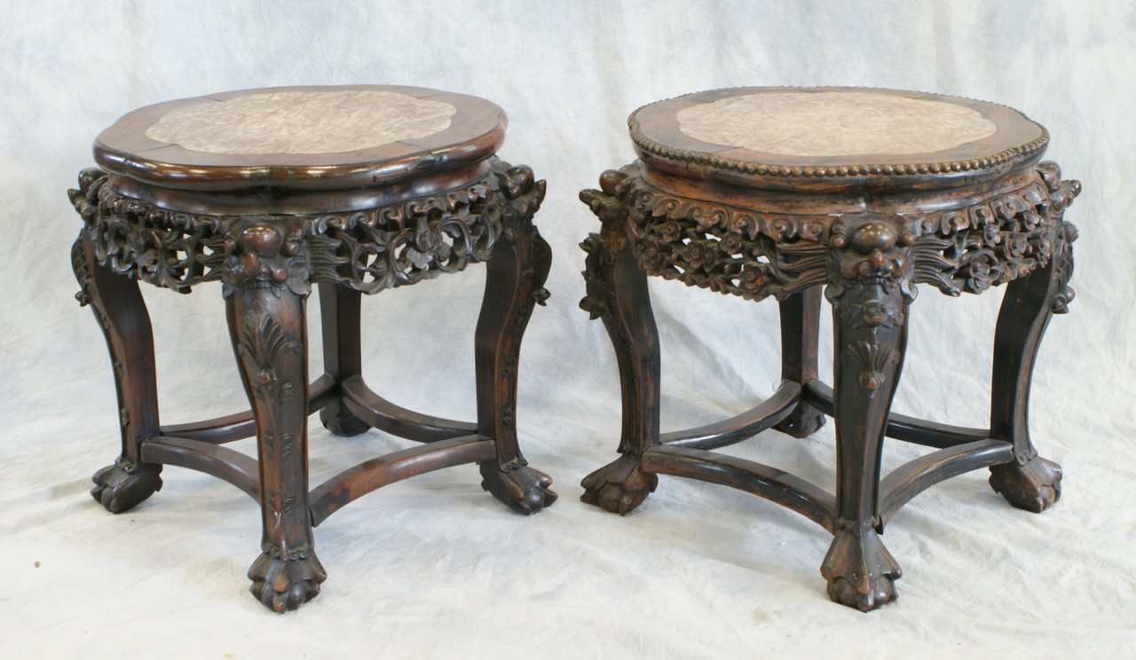 Appraisal: Two similar carved rosewood Chinese taboret with marble inserts diameter