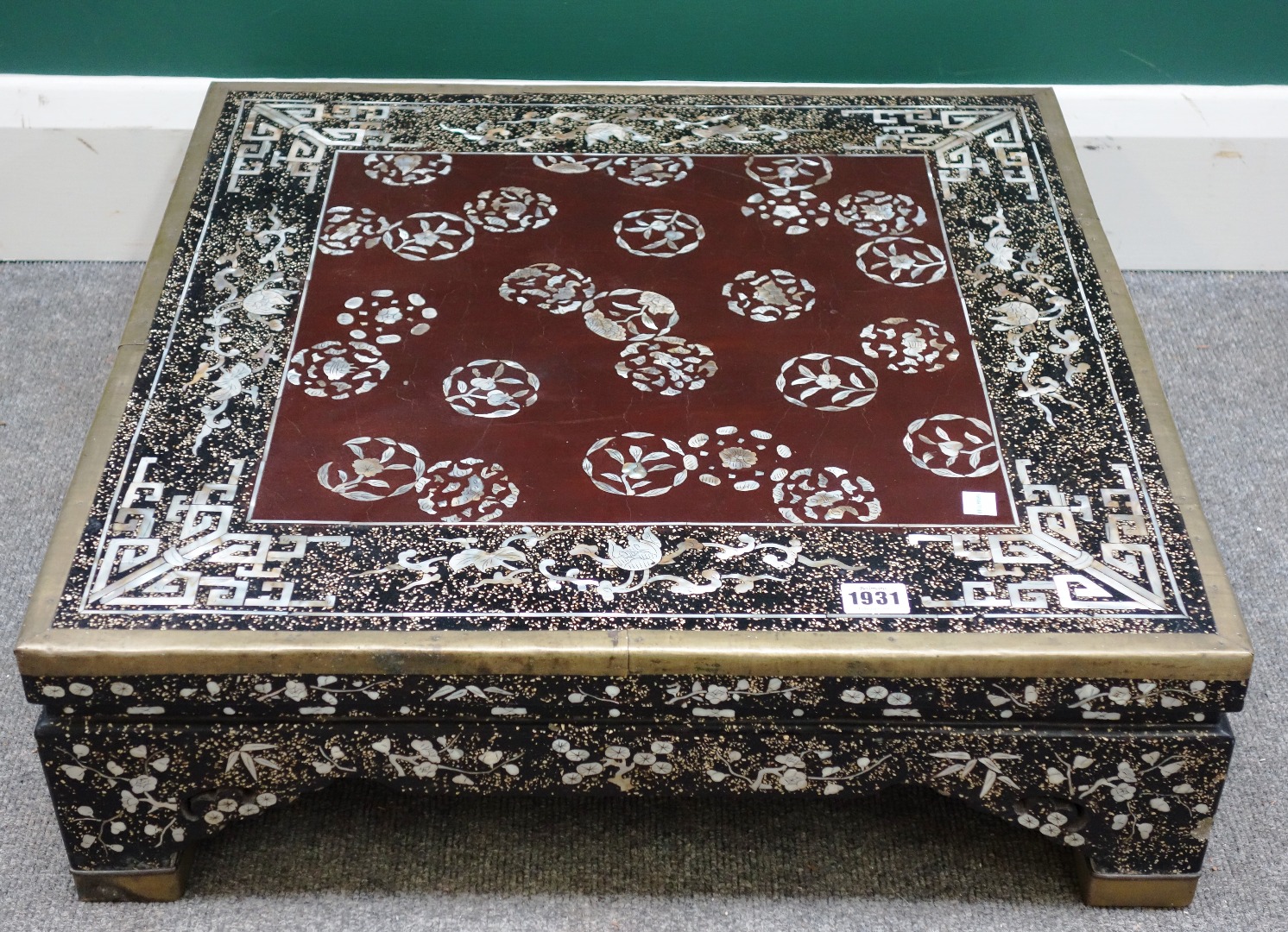 Appraisal: A th century Chinese mother-of-pearl inlaid lacquered square footrest low