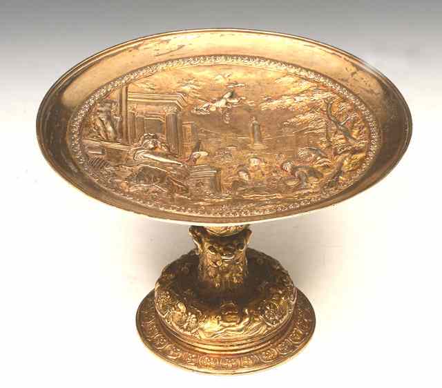 Appraisal: A GILT METAL ITALIAN TAZZA cast with a classical street