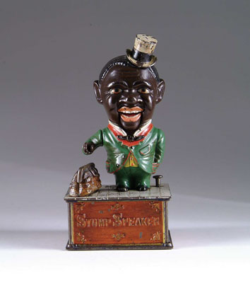 Appraisal: STUMP SPEAKER MECHANICAL BANK The bank depicts a black carpet