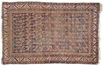 Appraisal: Persian rug rows of repeating geometric designs on dark blue