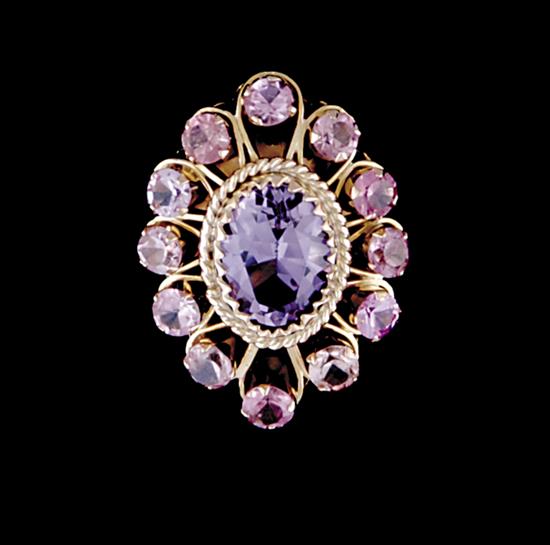 Appraisal: Two gemstone cocktail rings amethyst ring set with center oval