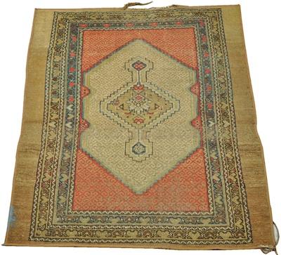 Appraisal: A Small Nomadic Carpet Approx '- x '- Low wool