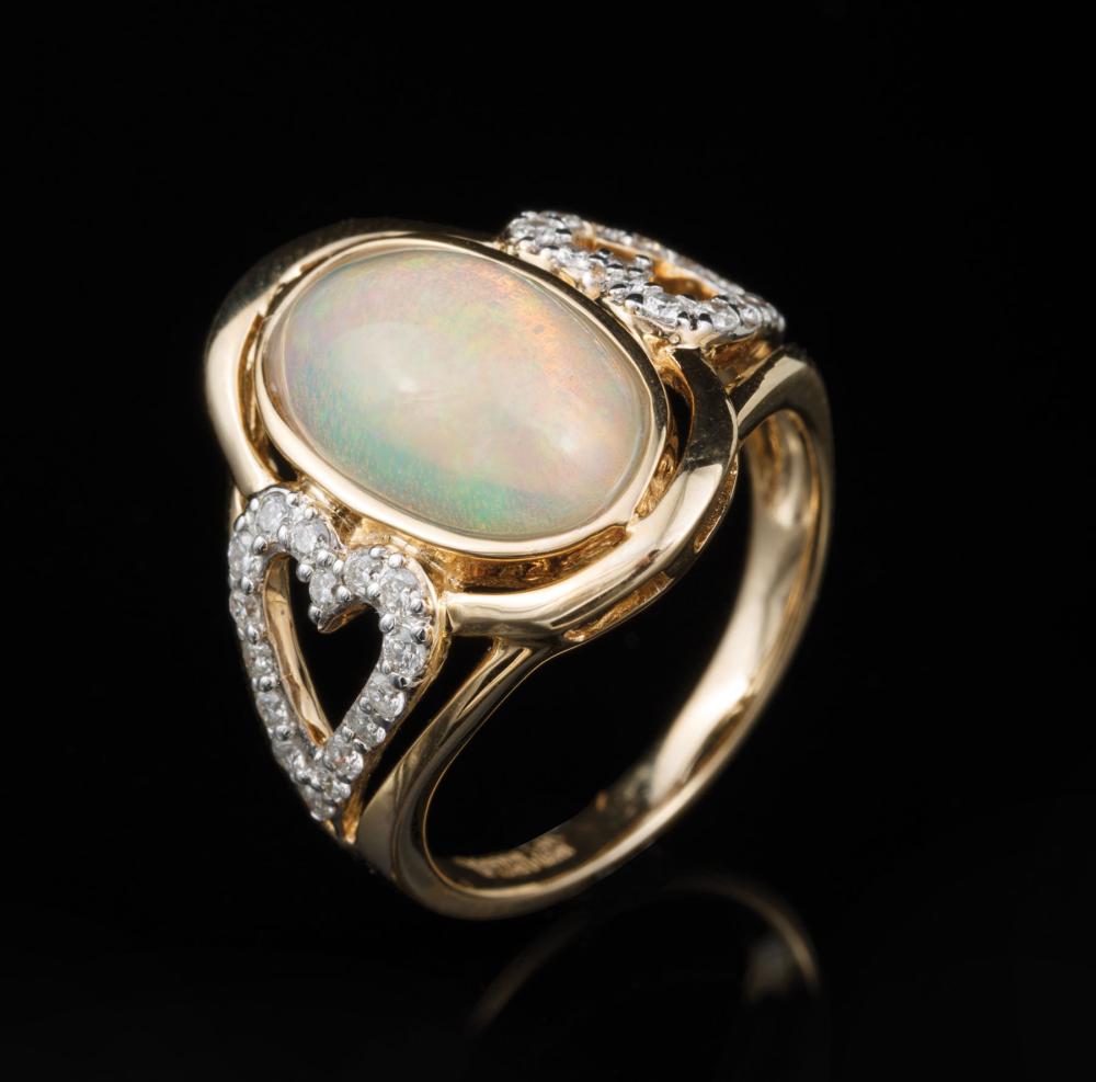 Appraisal: kt Yellow Gold Opal and Diamond Ring center bezel set