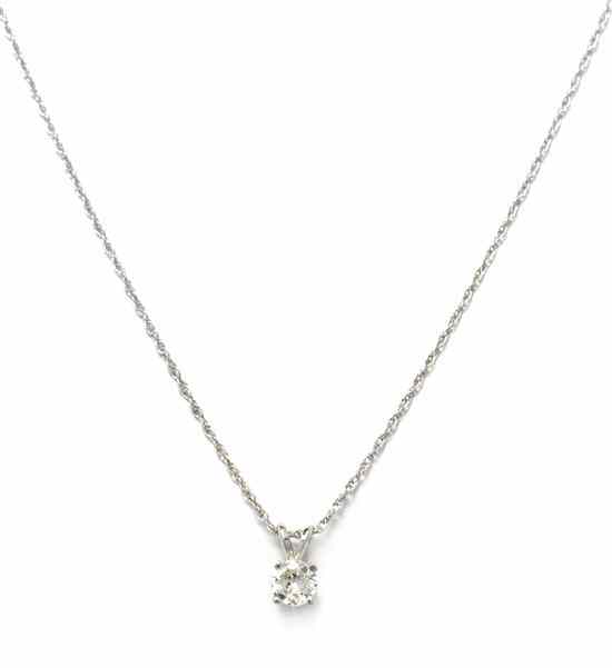 Appraisal: A Karat White Gold and Diamond Solitaire Pendant Necklace containing