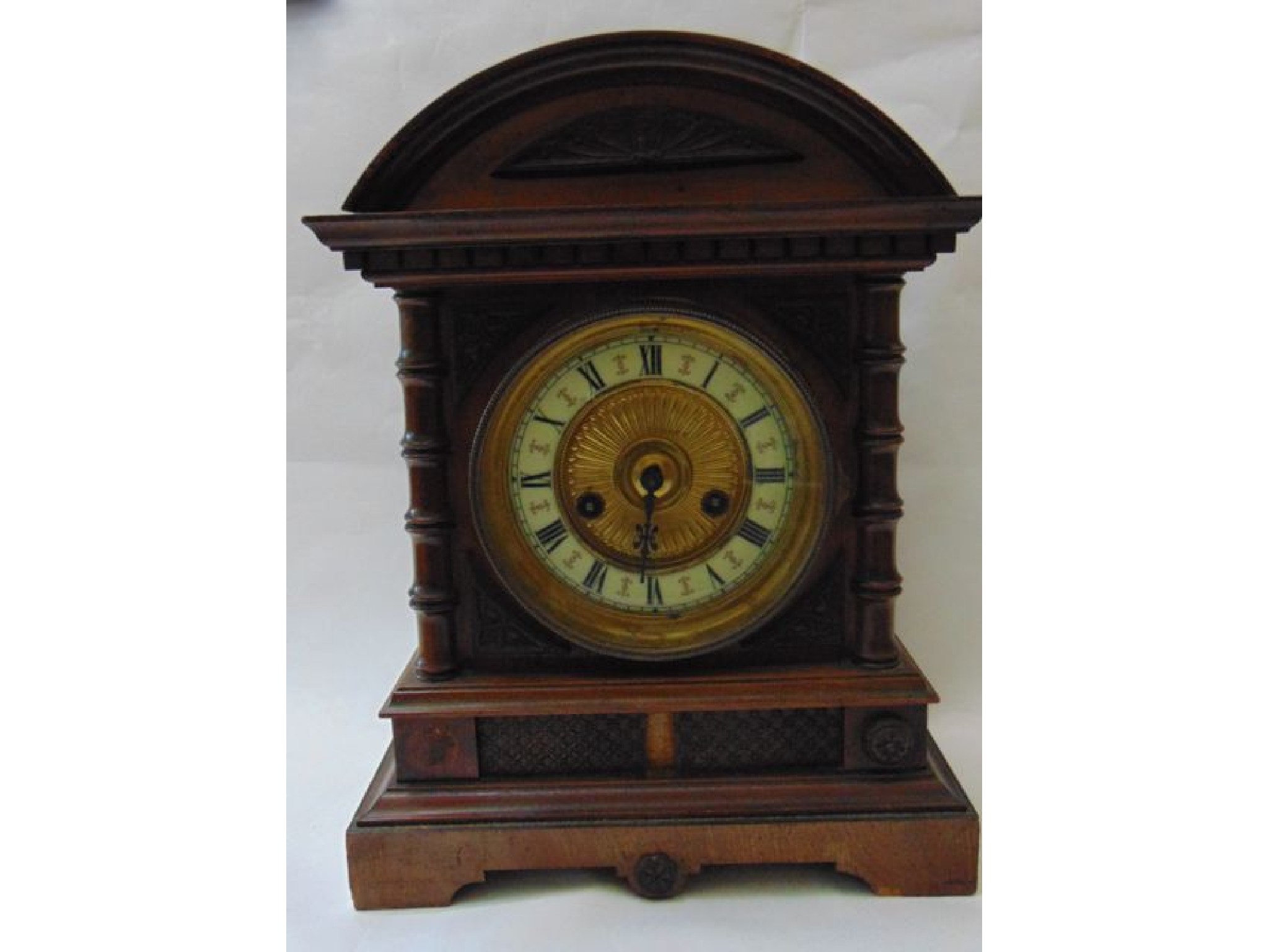 Appraisal: A late th century continental walnut cased mantle clock with