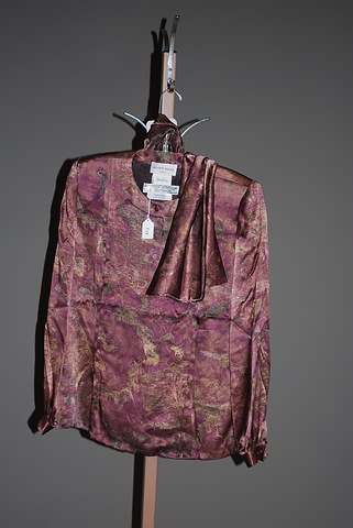 Appraisal: Andr Laug crimson aubergine long sleeve silk print blouse oriental