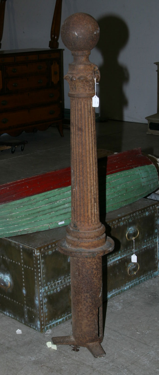 Appraisal: AMERICAN CAST-IRON FLUTED COLUMN-FORM HITCHING POST WITH BALL TOP Height