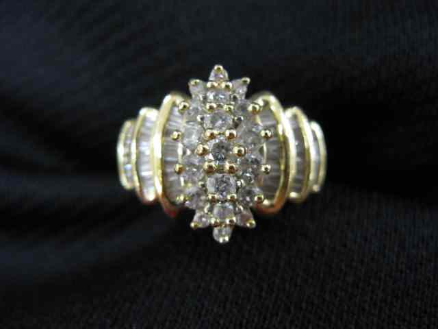 Appraisal: Diamond Ring cluster of round baguette diamonds totaling carats in