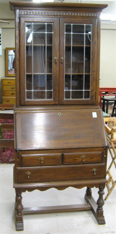 Appraisal: AN OAK SECRETARY BOOKCASE Ethan Allen Furniture Co th century